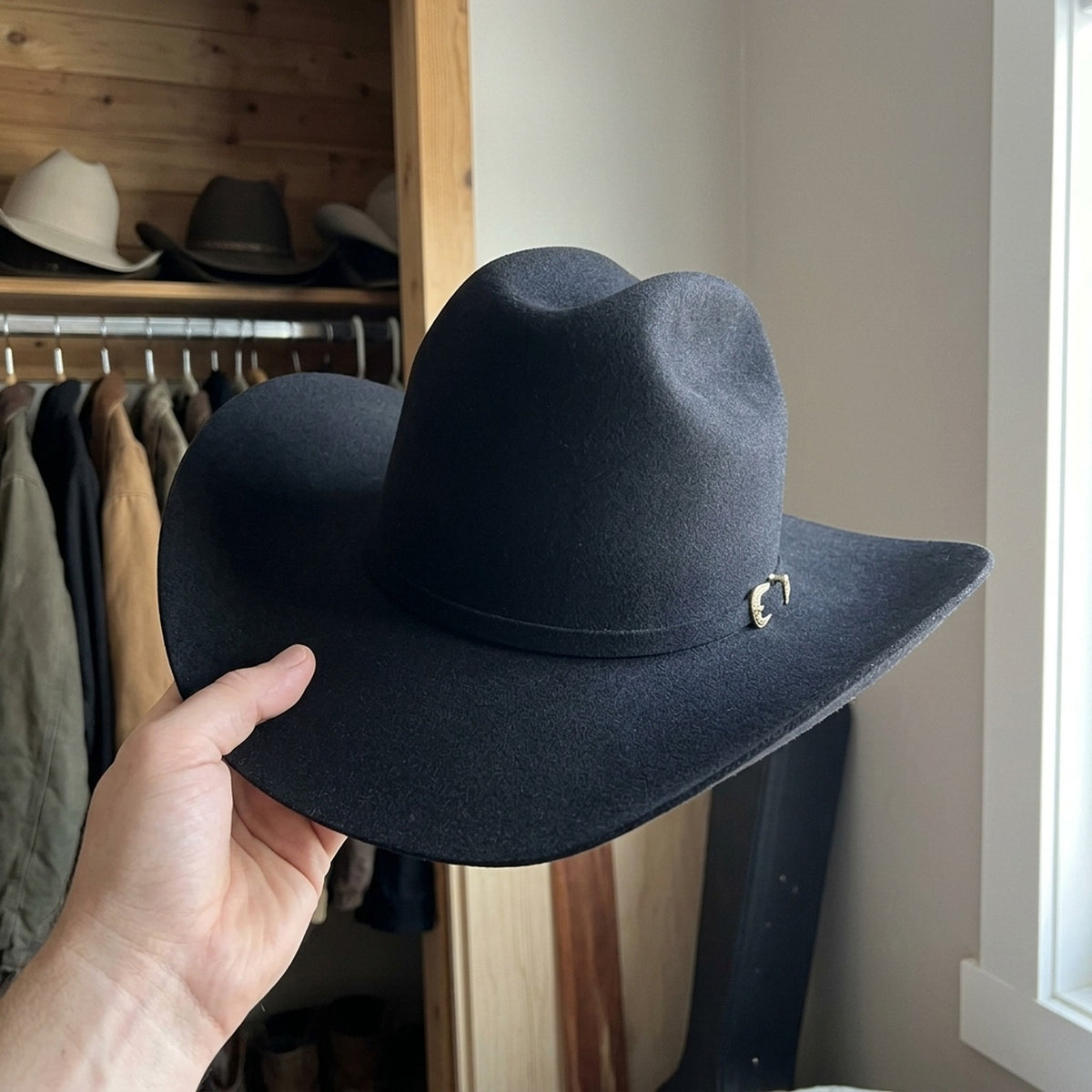 Black Wool Felt Cowboy Hat with Gold Metal Ornament