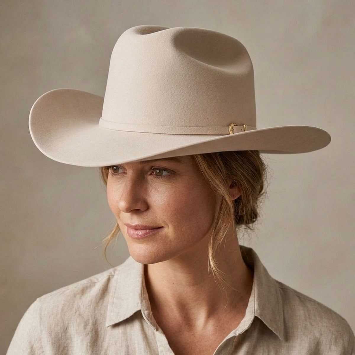 Cream Felt Cowboy Hat with Pinched Crown and Curved Brim