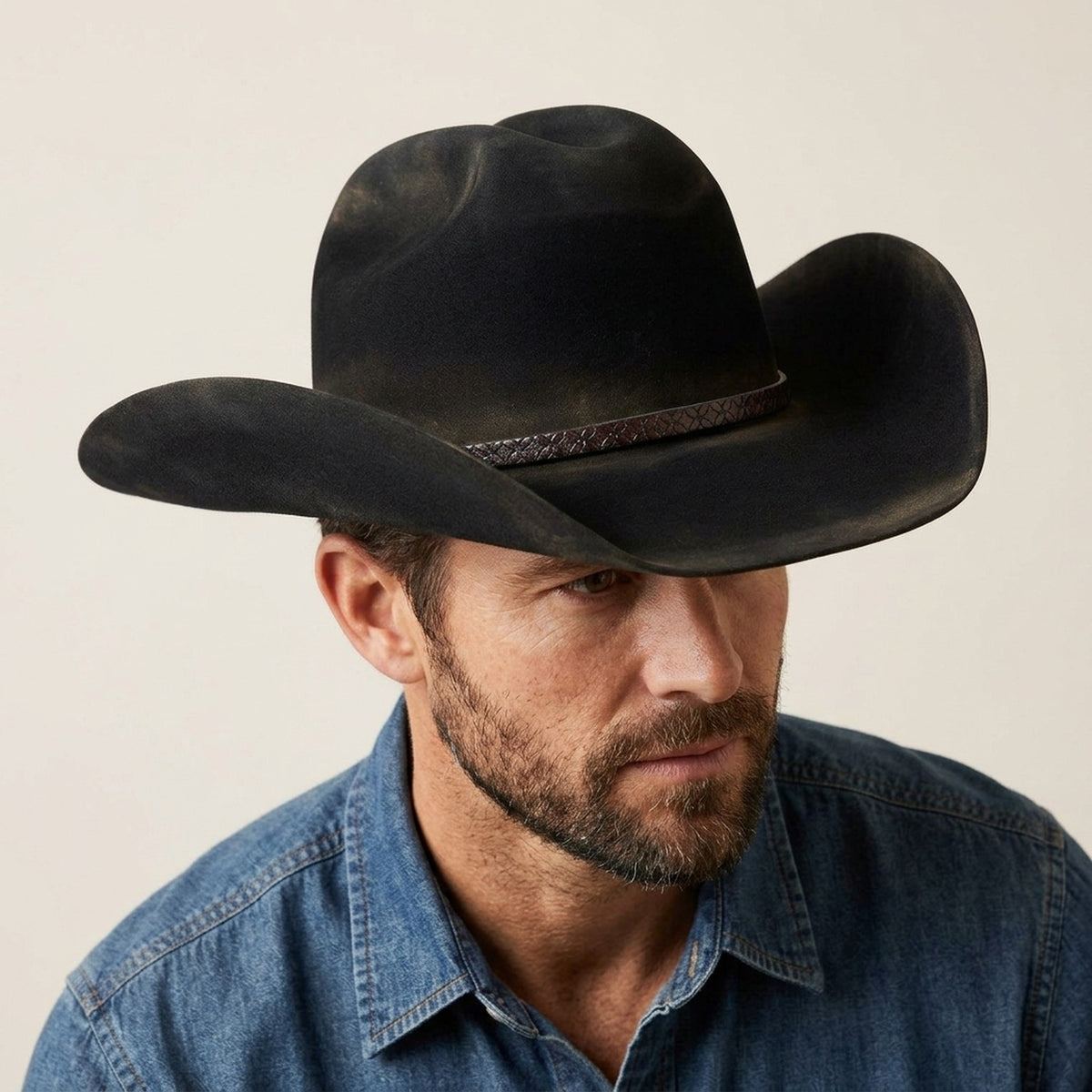 Distressed Black Felt Cowboy Hat with Tooled Leather Band