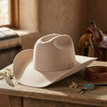 Unisex Beige Felt Cowboy Hat with Leather Band and Silver Buckle