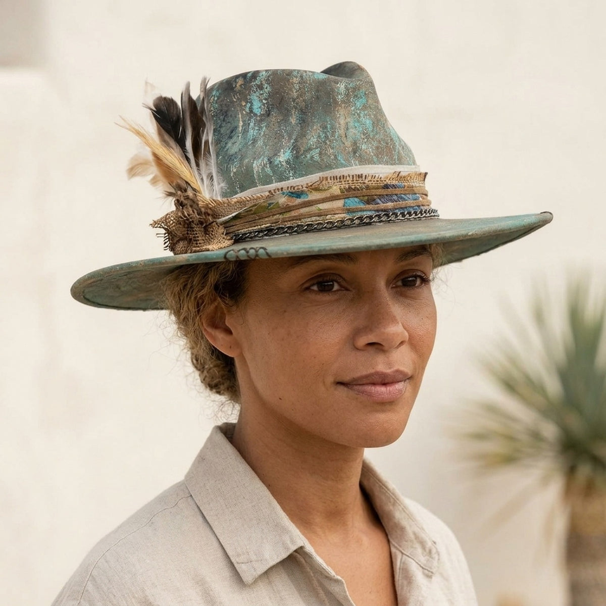 Teal Distressed Fedora with Burlap Bow and Feather Cluster