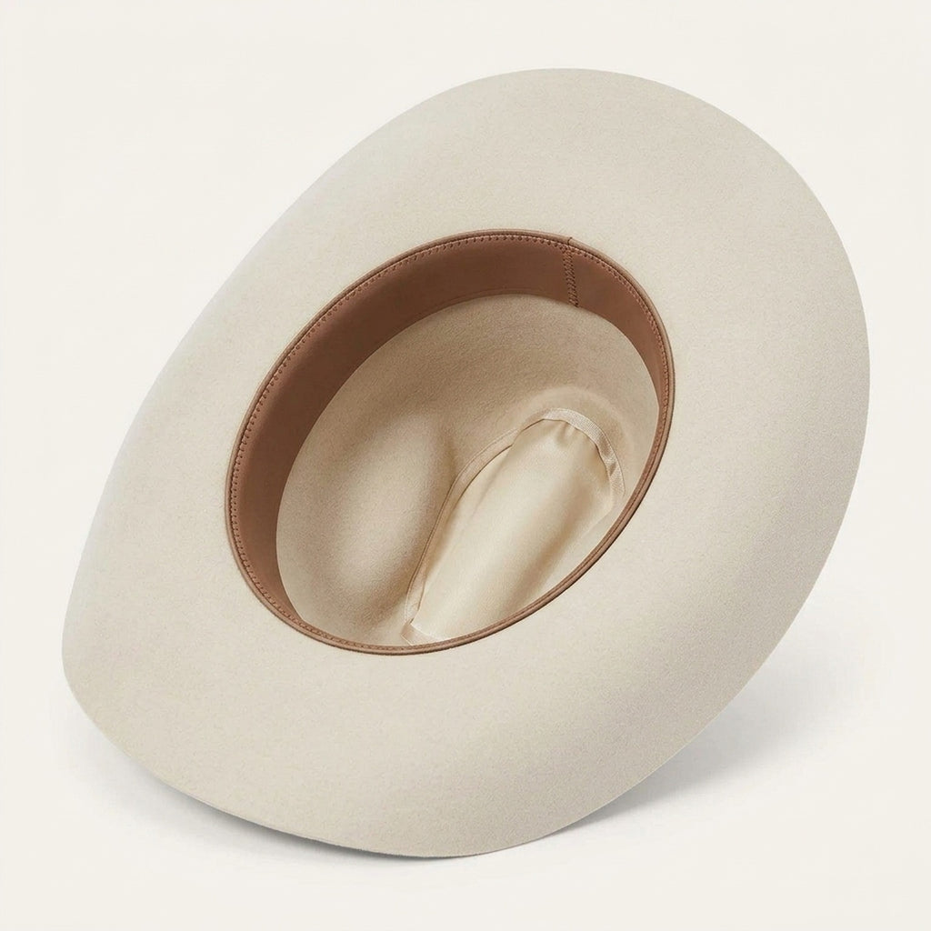Cream Wool Felt Cowboy Hat with Feather Accent and Upturned Brim