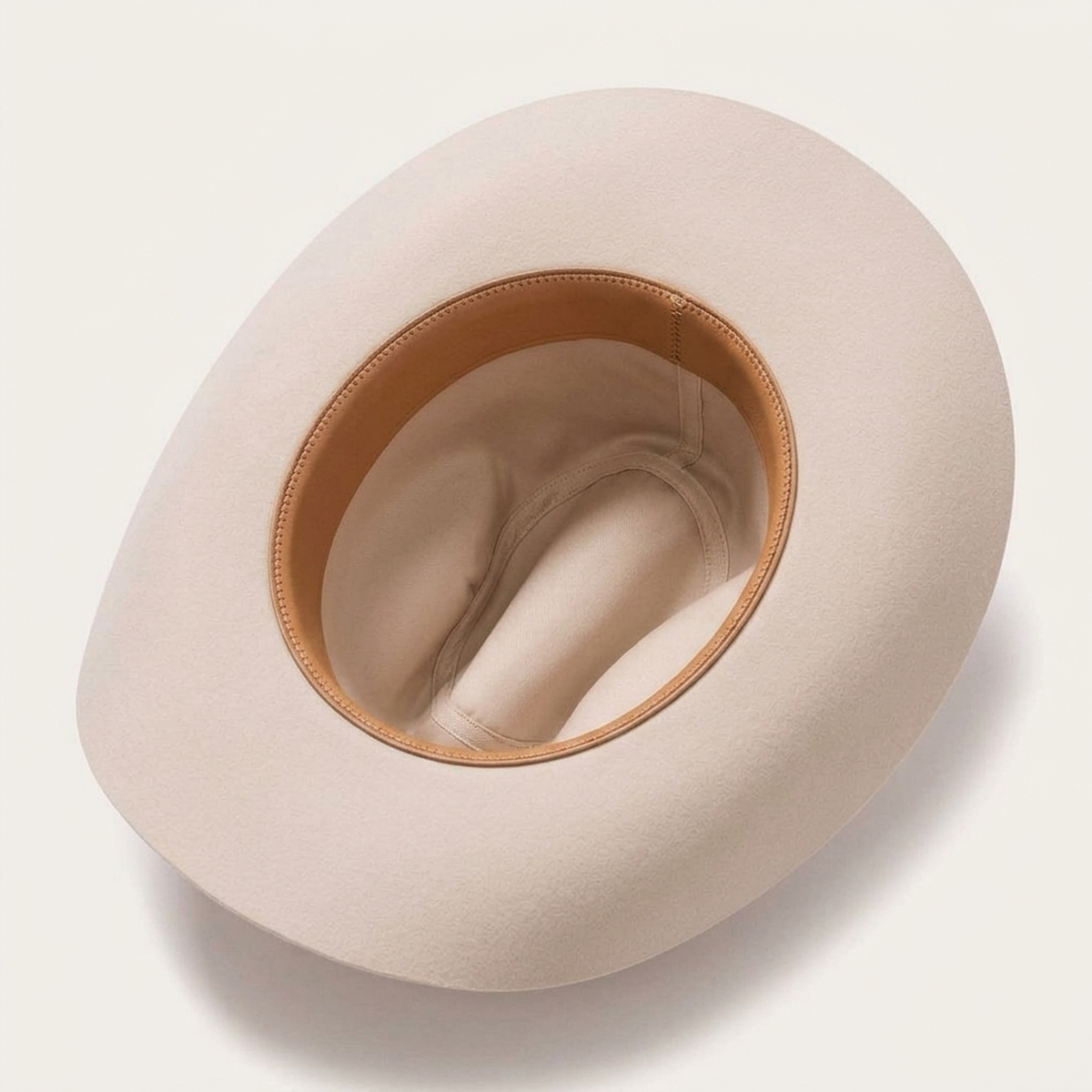 Cream Felt Cowboy Hat with Pinched Crown and Curved Brim