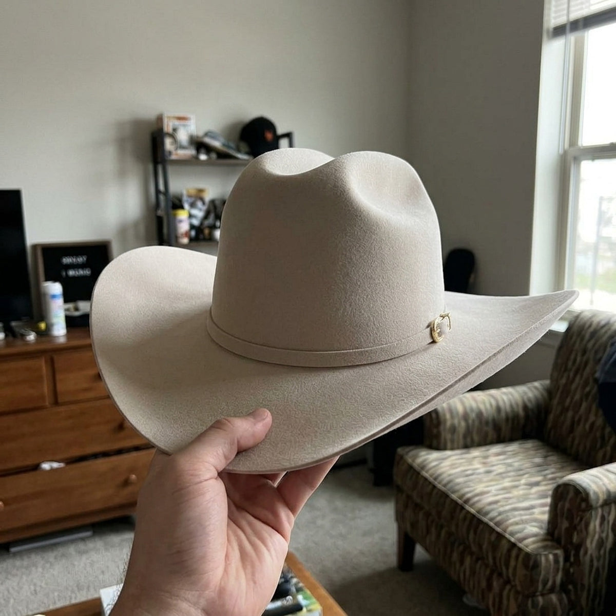 Cream Felt Cowboy Hat with Pinched Crown and Curved Brim